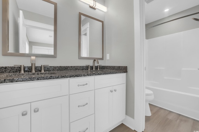 330 51st Ave N, North Myrtle Beach, SC 29582 - full bath with double vanity, wood finished floors, and tub / shower combination