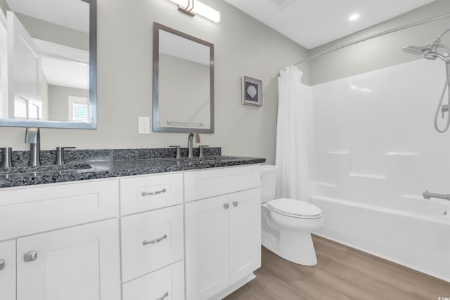 330 51st Ave N, North Myrtle Beach, SC 29582 - bathroom with double vanity, shower / tub combo, and wood finished floors