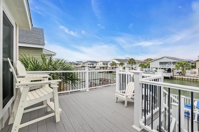 330 51st Ave N, North Myrtle Beach, SC 29582 - wooden deck with a water view and a residential view