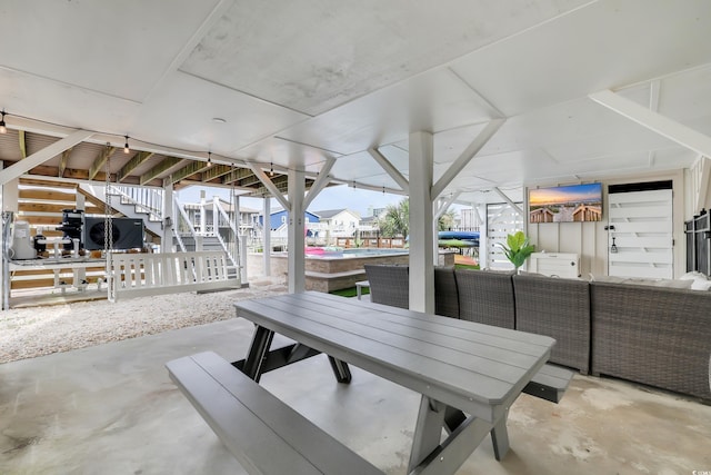 330 51st Ave N, North Myrtle Beach, SC 29582 - view of patio / terrace featuring stairway, outdoor dining space, and an outdoor hangout area