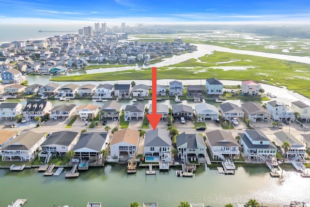 330 51st Ave N, North Myrtle Beach, SC 29582 - aerial perspective of suburban area featuring a local golf course and a nearby body of water
