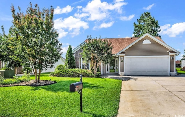 241 Carolina Crossing Blvd, Little River, SC 29566 - view of front of home featuring driveway, an attached garage, and a front yard