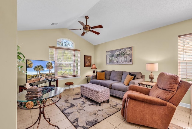 241 Carolina Crossing Blvd, Little River, SC 29566 - living room featuring ceiling fan, vaulted ceiling, and light tile patterned floors