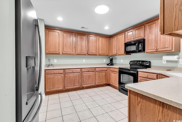 241 Carolina Crossing Blvd, Little River, SC 29566 - kitchen featuring black appliances, light tile patterned floors, and recessed lighting