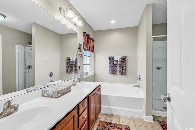 241 Carolina Crossing Blvd, Little River, SC 29566 - full bath featuring a shower stall, tile patterned flooring, a bath, double vanity, and a textured ceiling