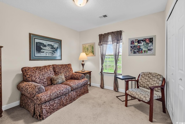 241 Carolina Crossing Blvd, Little River, SC 29566 - living area with carpet floors and a textured ceiling