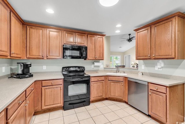 241 Carolina Crossing Blvd, Little River, SC 29566 - kitchen with black appliances, light tile patterned flooring, vaulted ceiling, light countertops, and recessed lighting