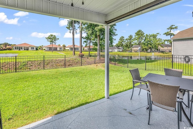 241 Carolina Crossing Blvd, Little River, SC 29566 - sunroom with a residential view, outdoor dining space, and a water view