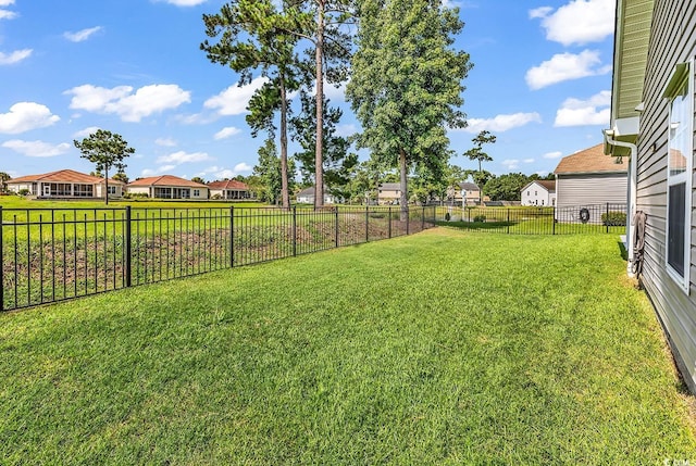 241 Carolina Crossing Blvd, Little River, SC 29566 - fenced backyard featuring a residential view