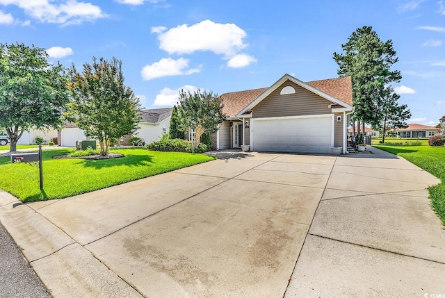 241 Carolina Crossing Blvd, Little River, SC 29566 - traditional home featuring driveway, a garage, a front lawn, and roof with shingles