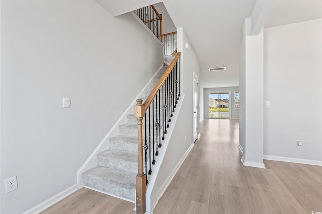 9051 Fort Hill Way, Myrtle Beach, SC 29579 - stairway featuring wood finished floors and baseboards