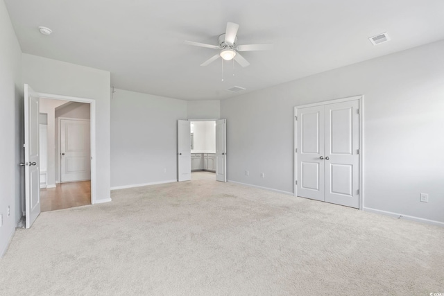 9051 Fort Hill Way, Myrtle Beach, SC 29579 - unfurnished bedroom featuring light carpet, ceiling fan, and ensuite bathroom