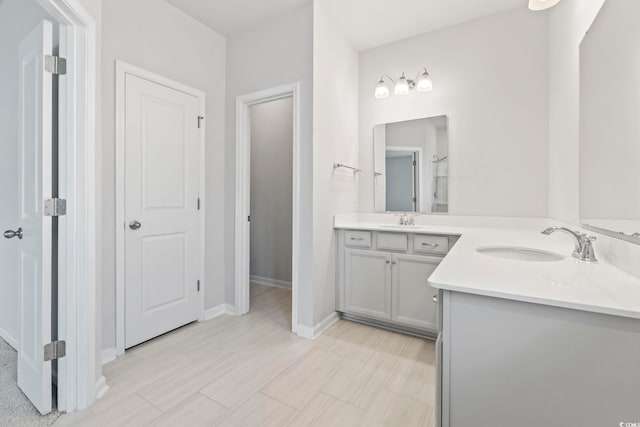 9051 Fort Hill Way, Myrtle Beach, SC 29579 - bathroom with double vanity and baseboards