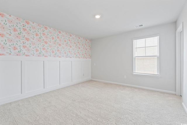 9051 Fort Hill Way, Myrtle Beach, SC 29579 - carpeted spare room with wallpapered walls, plenty of natural light, and a wainscoted wall