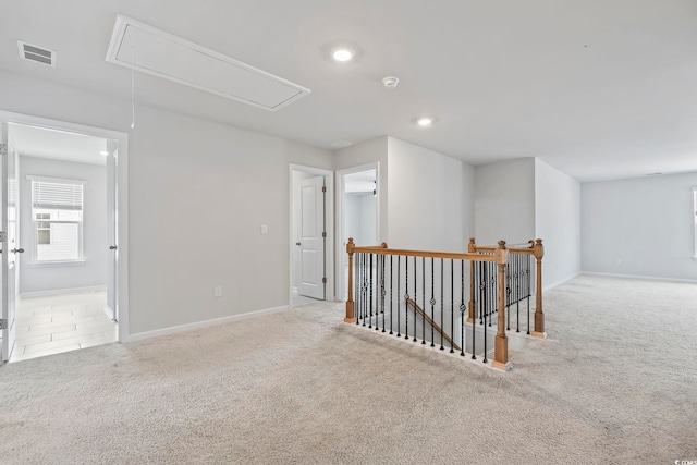 9051 Fort Hill Way, Myrtle Beach, SC 29579 - spare room with attic access, carpet flooring, a smoke detector, and recessed lighting