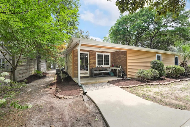 4233 Mica Ave, Little River, SC 29566 - view of front of property with a patio area