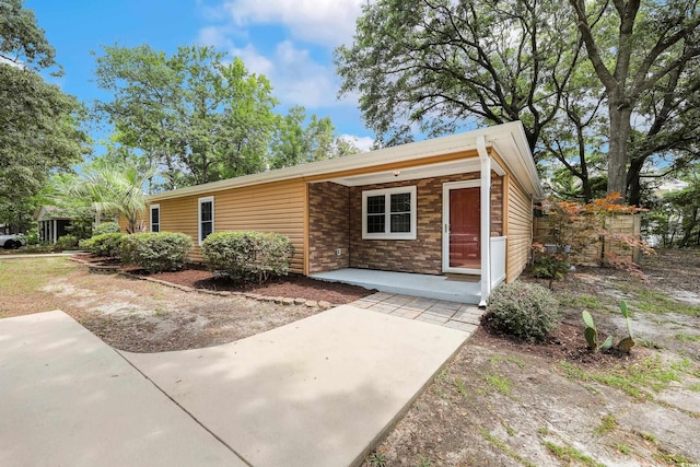 4233 Mica Ave, Little River, SC 29566 - ranch-style house with a porch
