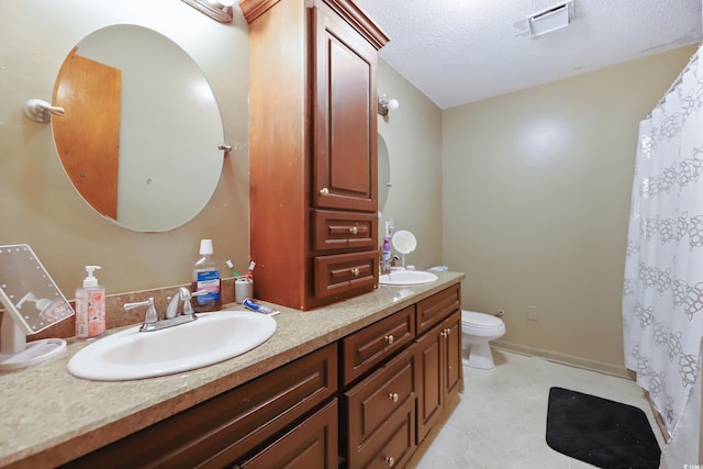 4233 Mica Ave, Little River, SC 29566 - full bath with double vanity, a textured ceiling, tile patterned floors, and a shower with shower curtain