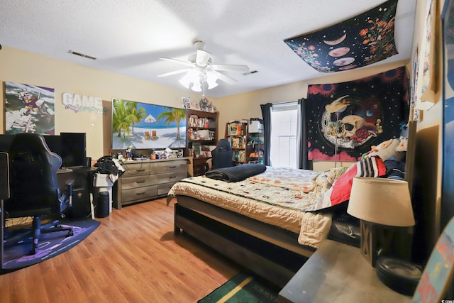 4233 Mica Ave, Little River, SC 29566 - bedroom with wood finished floors and a ceiling fan