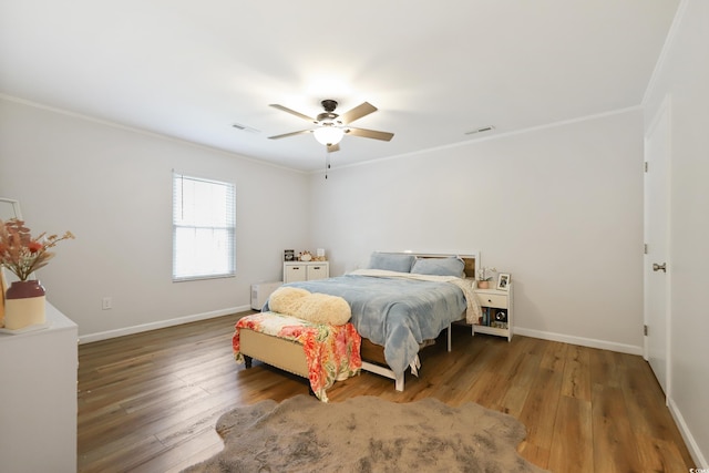 4233 Mica Ave, Little River, SC 29566 - bedroom featuring crown molding, hardwood / wood-style flooring, and a ceiling fan