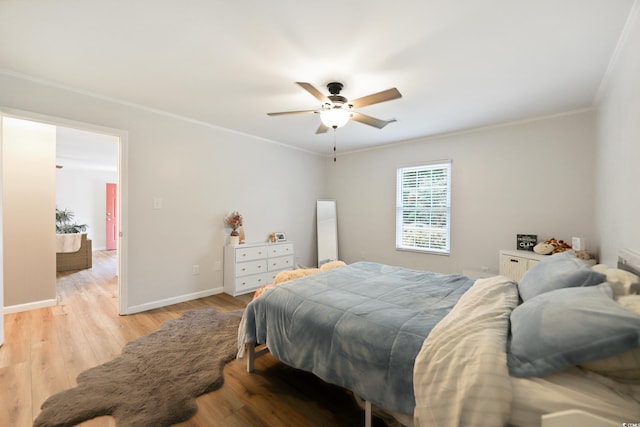 4233 Mica Ave, Little River, SC 29566 - bedroom featuring crown molding, light wood-type flooring, and a ceiling fan