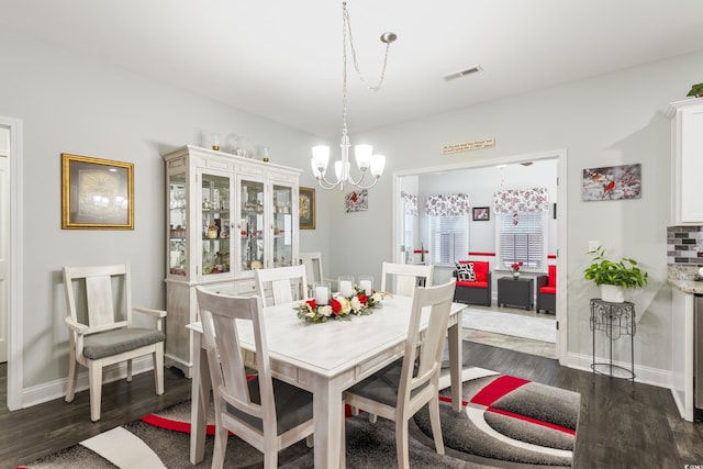 116 Olympus Ln, Conway, SC 29527 - dining room with a chandelier and dark wood finished floors
