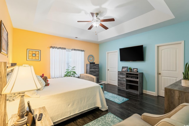 116 Olympus Ln, Conway, SC 29527 - bedroom with a raised ceiling, dark wood finished floors, and a ceiling fan