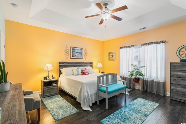 116 Olympus Ln, Conway, SC 29527 - bedroom featuring a raised ceiling, wood finished floors, and a ceiling fan