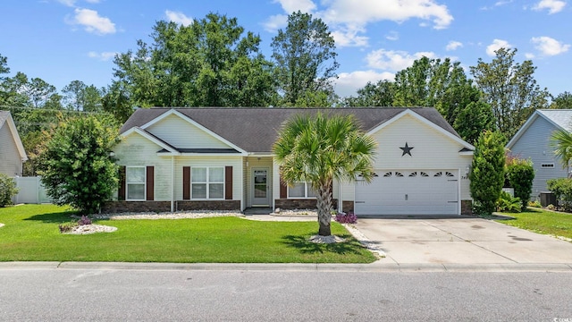 3484 Trailside Dr, Little River, SC 29566 - ranch-style house featuring an attached garage, driveway, stone siding, and a front lawn