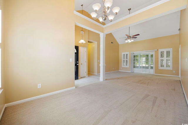 3484 Trailside Dr, Little River, SC 29566 - empty room with light colored carpet, high vaulted ceiling, a chandelier, ceiling fan, and ornamental molding