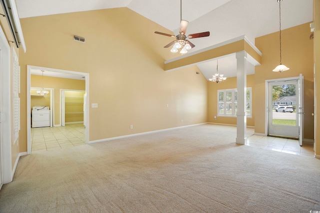 3484 Trailside Dr, Little River, SC 29566 - spare room with washer / dryer, high vaulted ceiling, light carpet, a chandelier, and a ceiling fan