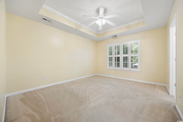 3484 Trailside Dr, Little River, SC 29566 - unfurnished room featuring a raised ceiling, crown molding, carpet, and ceiling fan