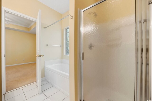 3484 Trailside Dr, Little River, SC 29566 - bathroom with a shower stall, a bath, tile patterned flooring, and ornamental molding