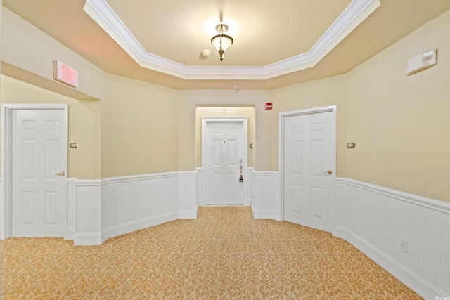 2180 Waterview Dr Unit 332, North Myrtle Beach, SC 29582 - hall with carpet, a wainscoted wall, crown molding, and a tray ceiling