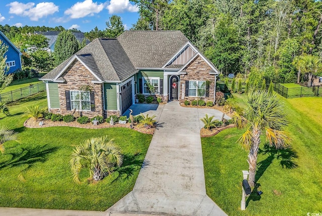 405 Palo Verde Dr, Myrtle Beach, SC 29579 - craftsman inspired home with stone siding, driveway, a garage, and a shingled roof