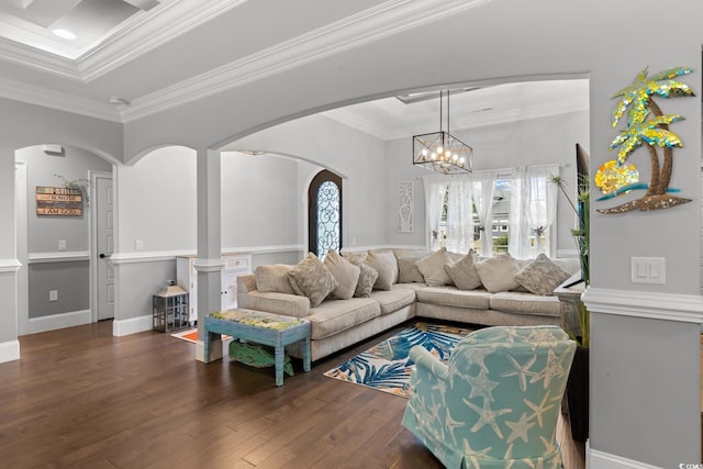405 Palo Verde Dr, Myrtle Beach, SC 29579 - living area featuring healthy amount of natural light, wood finished floors, crown molding, arched walkways, and a chandelier