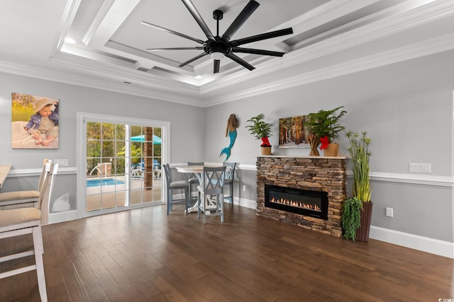 405 Palo Verde Dr, Myrtle Beach, SC 29579 - dining area with a ceiling fan, a tray ceiling, hardwood / wood-style flooring, a fireplace, and ornamental molding