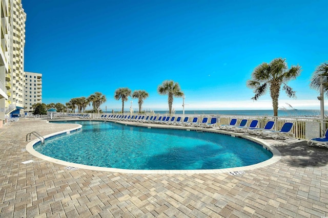 2711 S Ocean Blvd Unit 1522, North Myrtle Beach, SC 29582 - community pool featuring a patio area and a water view