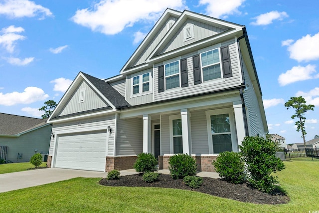 225 Astoria Park Loop, Conway, SC 29526 - view of front of home featuring board and batten siding, covered porch, brick siding, and concrete driveway