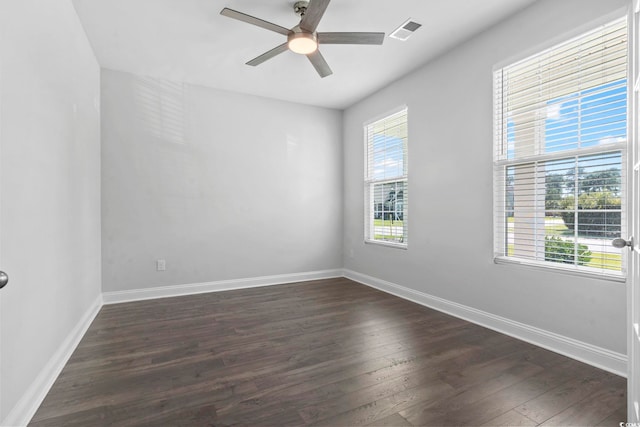 225 Astoria Park Loop, Conway, SC 29526 - empty room featuring plenty of natural light, dark wood finished floors, and a ceiling fan