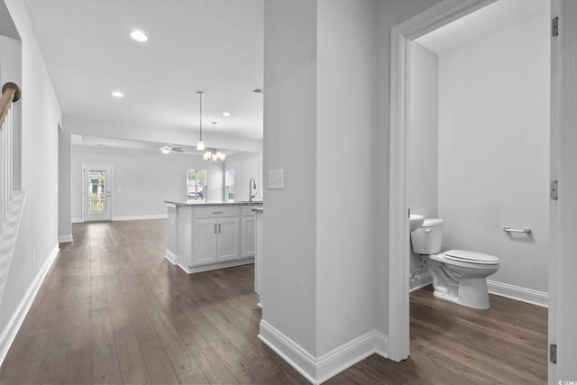 225 Astoria Park Loop, Conway, SC 29526 - hallway featuring dark wood-style floors, recessed lighting, and a chandelier