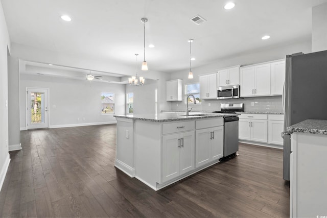 225 Astoria Park Loop, Conway, SC 29526 - kitchen with stainless steel appliances, dark wood-style flooring, white cabinetry, recessed lighting, and ceiling fan