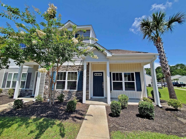 1017 Dinger Dr Unit 1017, Myrtle Beach, SC 29588 - view of front facade featuring covered porch and stone siding