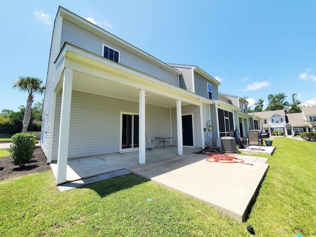 1017 Dinger Dr Unit 1017, Myrtle Beach, SC 29588 - back of house with a lawn and a patio area
