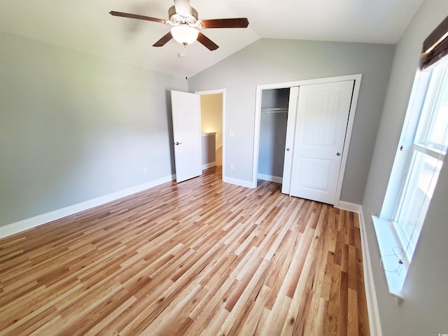 1017 Dinger Dr Unit 1017, Myrtle Beach, SC 29588 - unfurnished bedroom featuring a closet, light wood-type flooring, vaulted ceiling, and ceiling fan