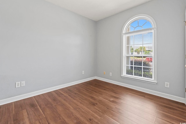 105 Ashley Park Dr Unit 2B, Myrtle Beach, SC 29579 - unfurnished room featuring baseboards and dark wood-style floors