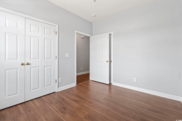 105 Ashley Park Dr Unit 2B, Myrtle Beach, SC 29579 - unfurnished bedroom featuring wood finished floors and a closet
