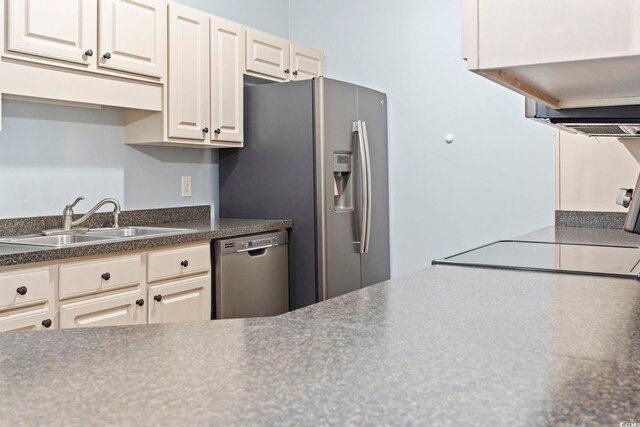 105 Ashley Park Dr Unit 2B, Myrtle Beach, SC 29579 - kitchen with appliances with stainless steel finishes and dark countertops