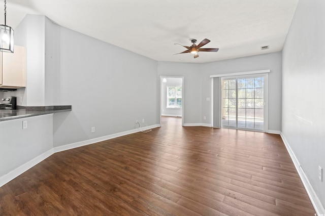 105 Ashley Park Dr Unit 2B, Myrtle Beach, SC 29579 - unfurnished living room featuring a ceiling fan and dark wood-type flooring