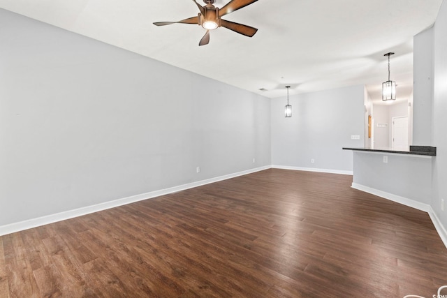 105 Ashley Park Dr Unit 2B, Myrtle Beach, SC 29579 - unfurnished living room featuring dark wood-type flooring and a ceiling fan